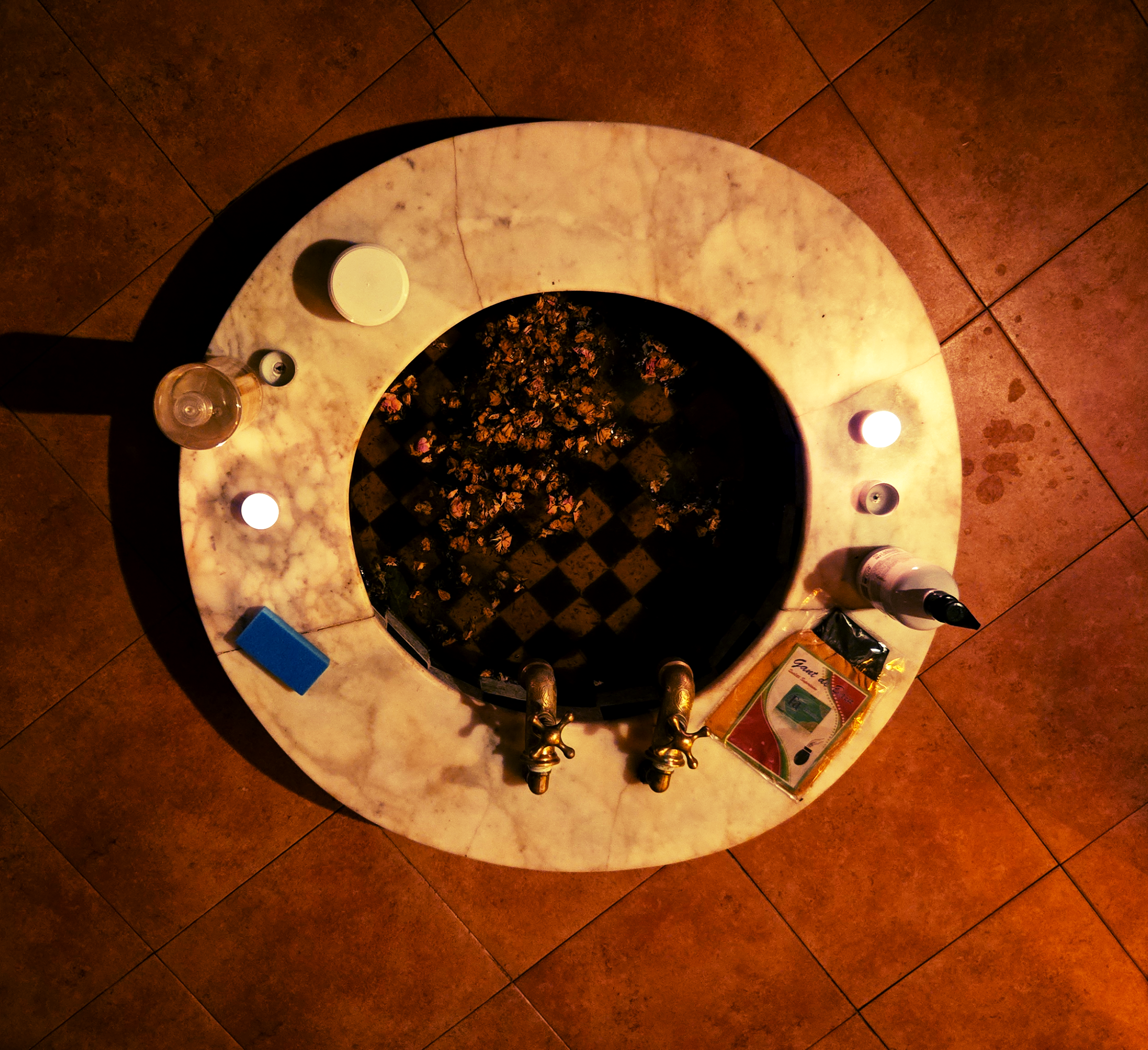 Hammam bench and marble basin at Hotel Riad Fantasia